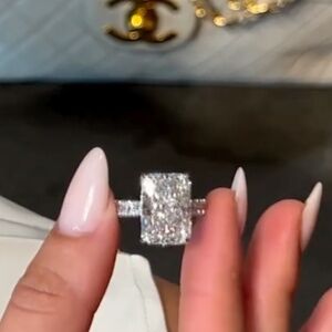 10 Carat radiant cut eternity band, sizing bar, donut, pavé underside